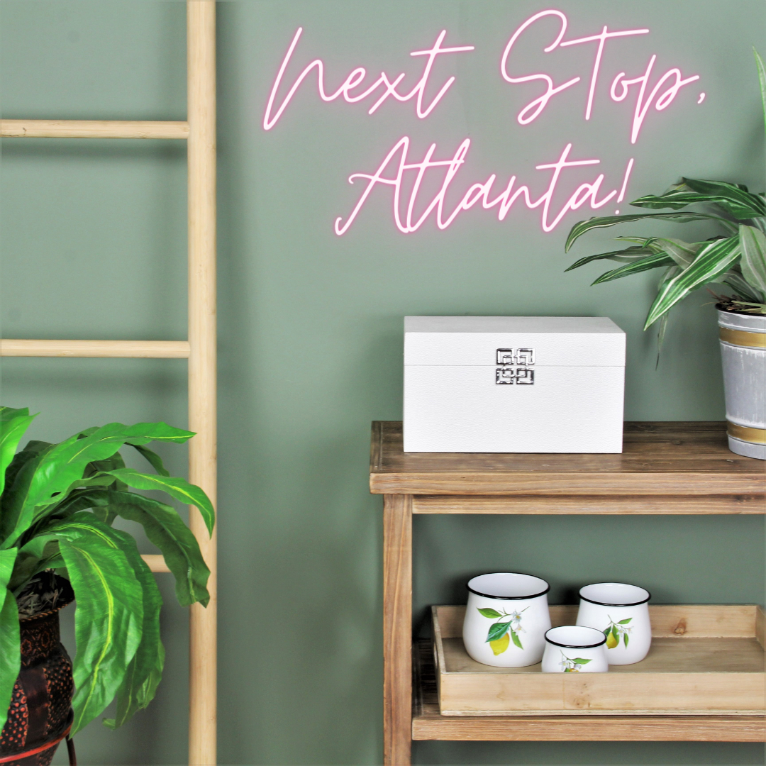 Home decor against a sage green back drop.