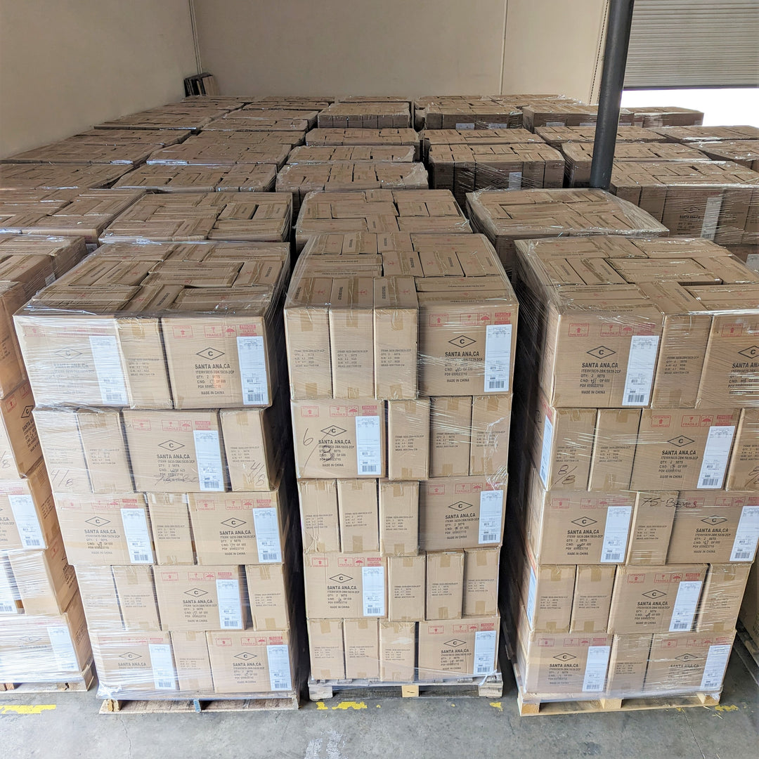 A large shipment of packed pallets waiting to be moved.